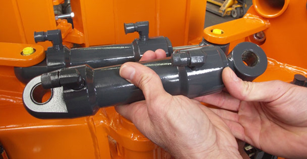Polymer plain bearings in the various hinges, locks and hydraulic cylinders of the root ball transplanter.